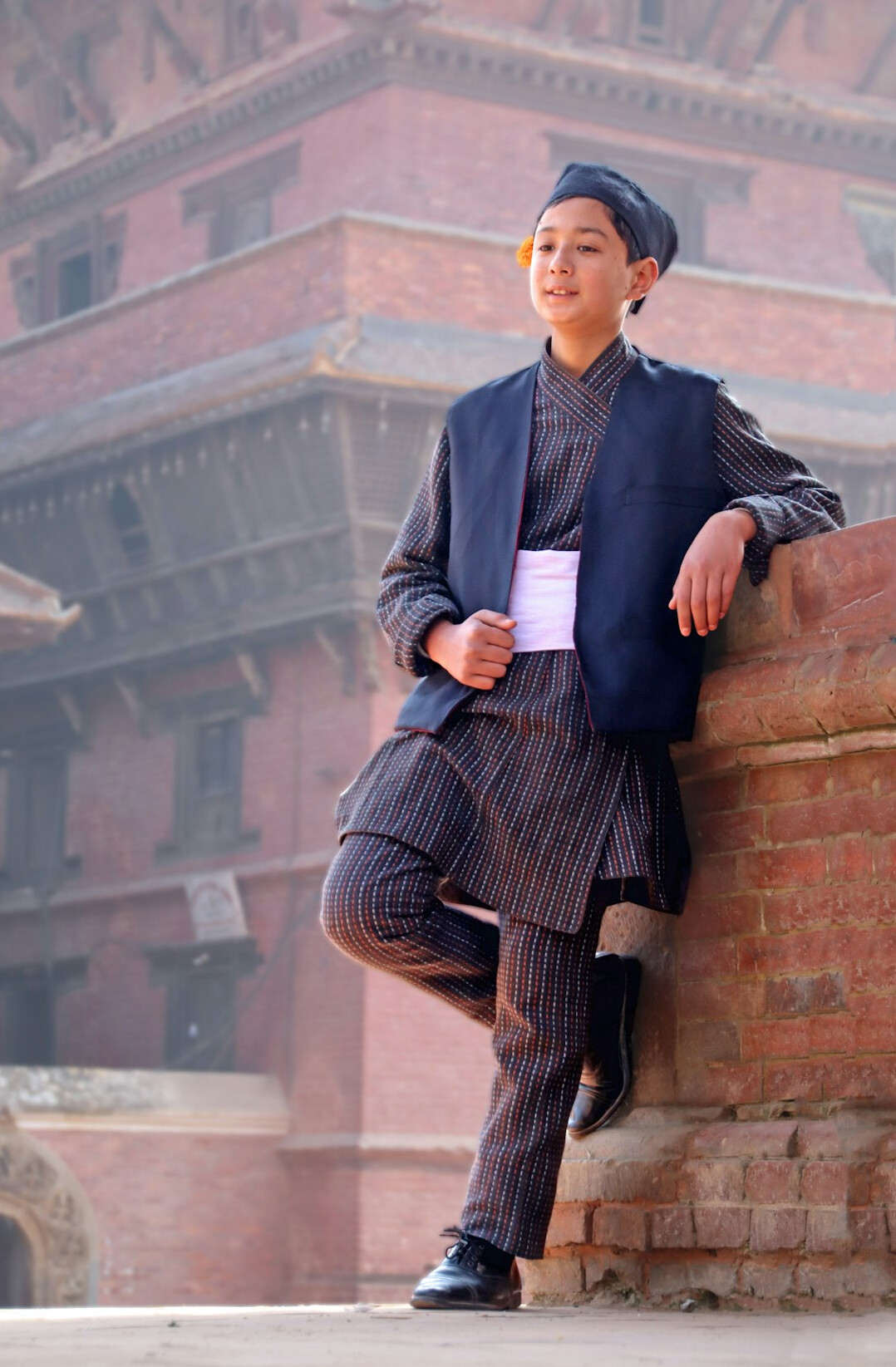 Businessman of South Asian descent in a fitted suit
