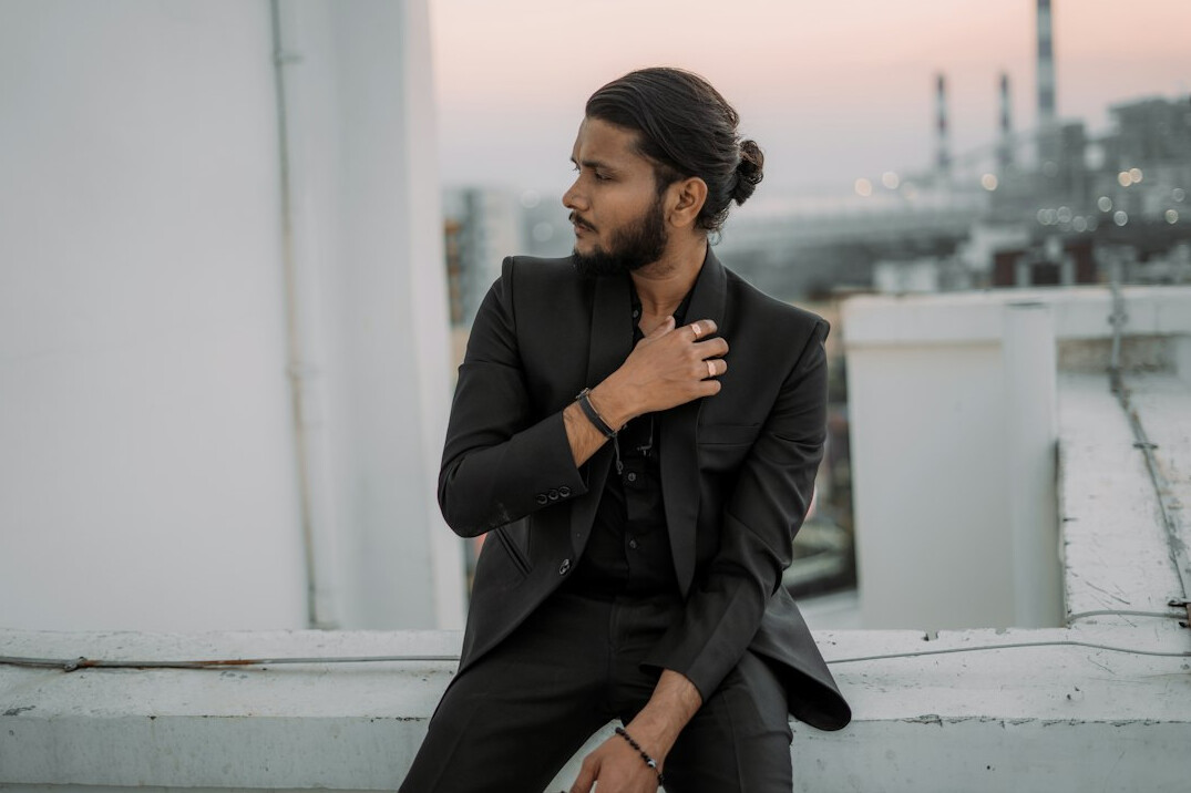 Young businessman with a beard wearing a casual blazer